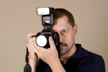 Fototapeta premium man with digital camera