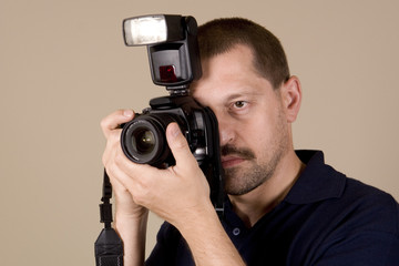 man with digital camera