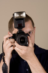 man with digital camera
