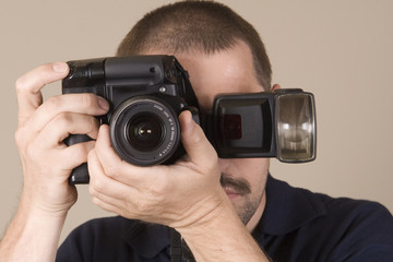 Fototapeta premium man with digital camera