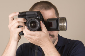 Fototapeta premium man with digital camera