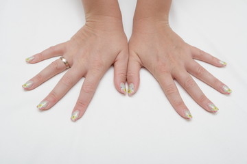 Naklejka premium beautiful hands showing nails with figure