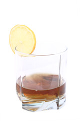 Cognac in a glass, with lemon