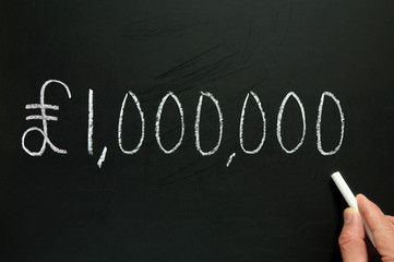 One million pounds, written on a blackboard.