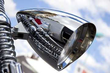 Street bike with chrome headlight