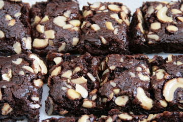 chocolate brownie fudge  sprinkled with cashew nuts