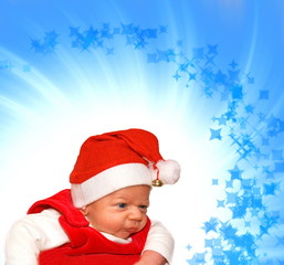 Adorable baby in Santa suit on abstract background