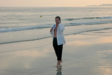 Businessman at the beach