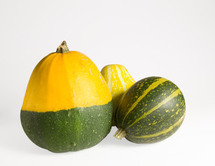 Three decorative pumpkins