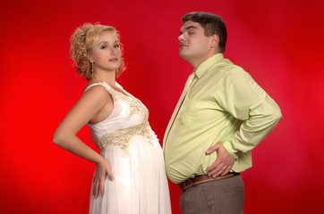 Who's belly larger?