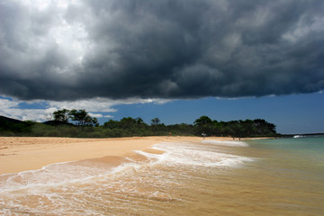 Storm forming above tropical beach