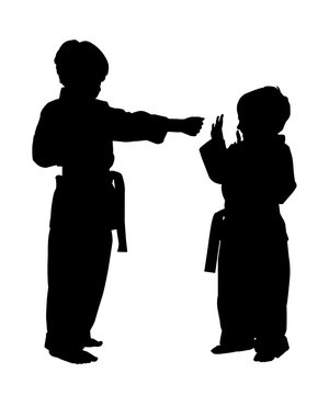 Silhouette With Clipping Path of Children doing Martial Arts