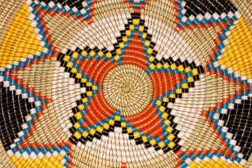 Colorful hand woven African basket