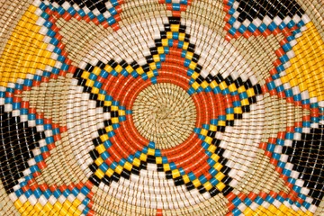 Zelfklevend Fotobehang Colorful hand woven African basket © EcoView
