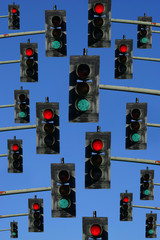 red and green lights on a sky blue background