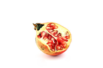half of pomegranate on white background