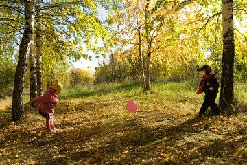 Children play a ball