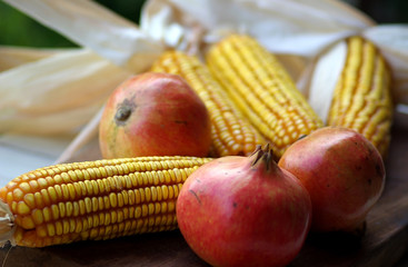  Yellow corn and f autumn fruits.