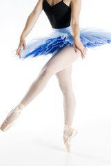 legs on pointe with blue tutu