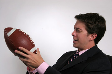 Business man with football