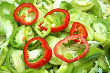 Close up of salad with fresh herbs  and bell peppers