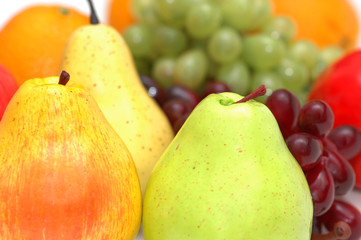 Pears and other fruits at the background