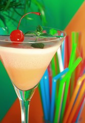 Alcoholic summer recreational drink with cherry