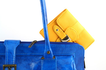 Yellow wallet in a handbag