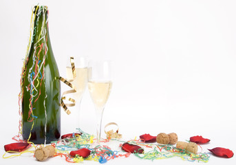 Champagne celebration party with bottle, glasses and decoration 