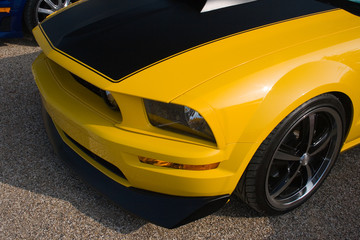 Bright yellow and black American muscle car