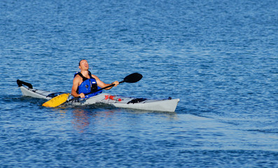 Kayaker emerges after float-asisted roll