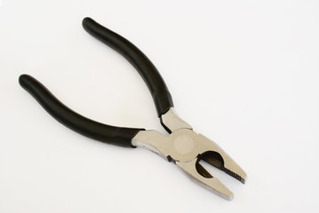 Lineman's pliers on white background