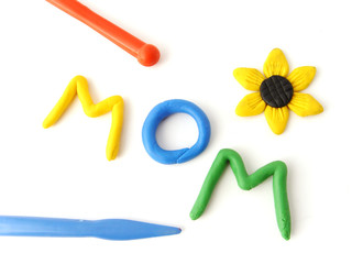 'mom' plasticine inscription