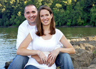 Cute young couple relaxed in each others arms