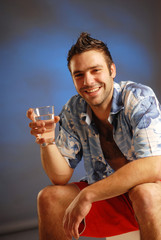 A man with a glass of water