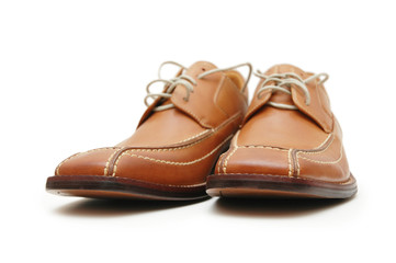 Orange male shoes isolated on the white