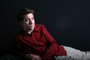 Recumbent man thinking