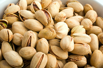 peanuts close-up in white china pot