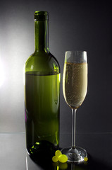 	white wine glass and bottle