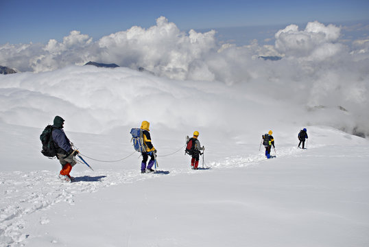 Five  climbers trekking down