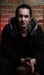 Fototapeta premium Portrait of a young gangster