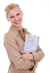 smiling blonde women holding a notebook