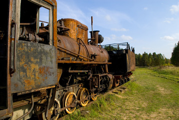 Fototapeta na wymiar Old rusty steam train