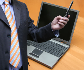 Businessman connecting with his portable via bluetooth