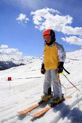 Teenager or Child Skiing in Winter