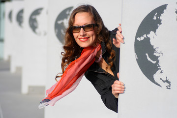 A smiling woman in the street park