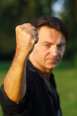 Aggressive Man showing his Fist