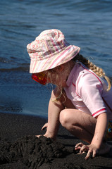 Child playing at the beach