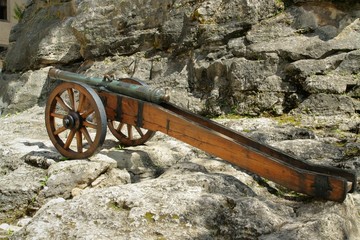 Old style cannon on castle