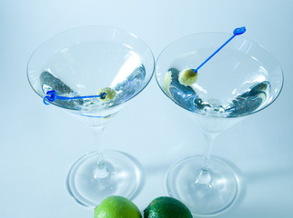 Cocktail glasses with olives closeup